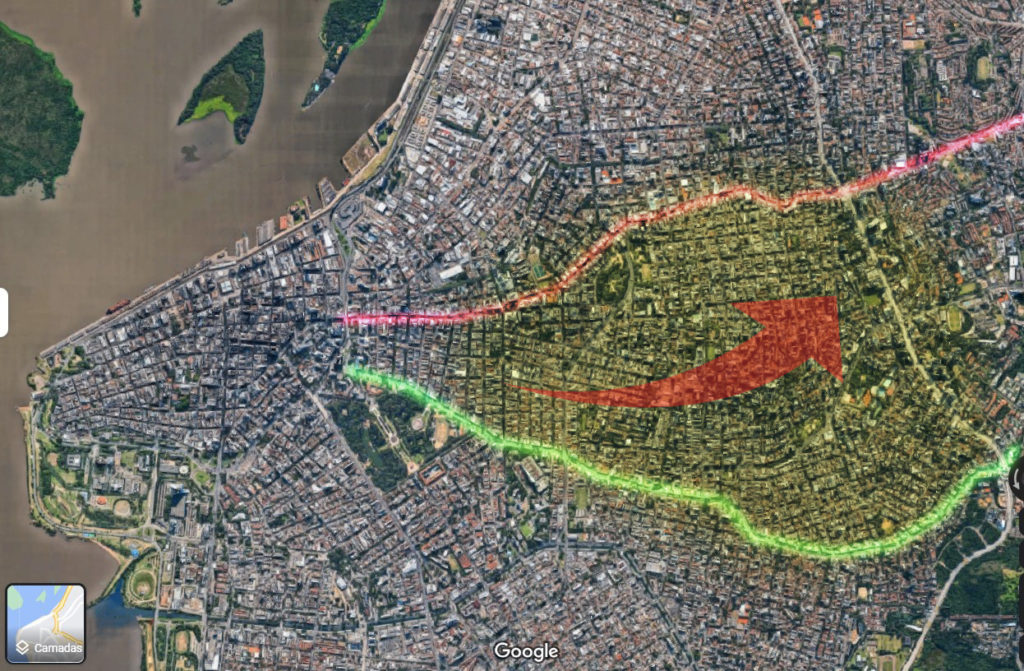 Foto de satélite de Porto Alegre, Google Maps. A marcação em amarelo indica a área da Colônia Africana, e a seta o seu sentido de deslocamento ao longo do século XX. Edição da pesquisadora.